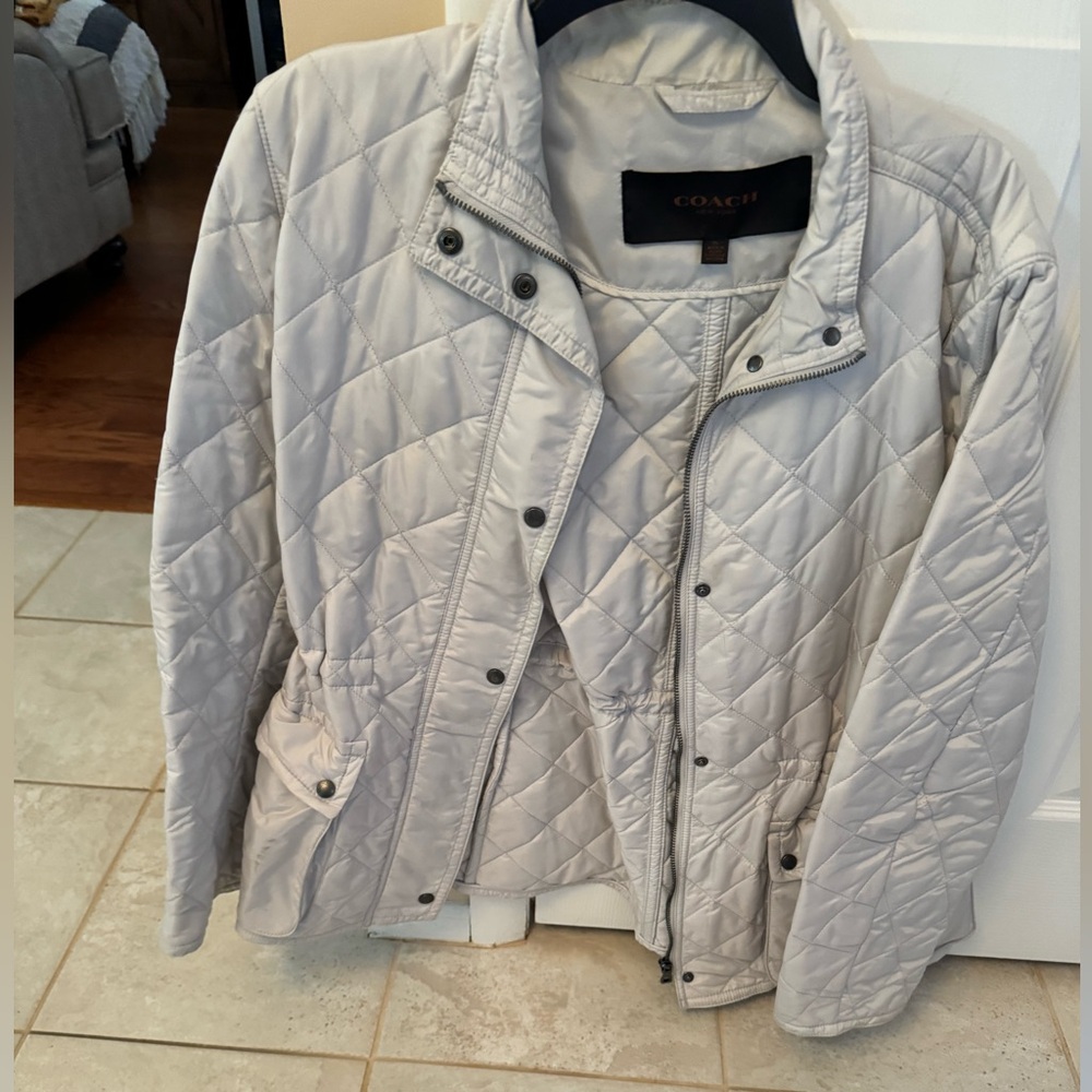 Beautiful coach quilted jacket size XL the color is a beautiful neutral sand
